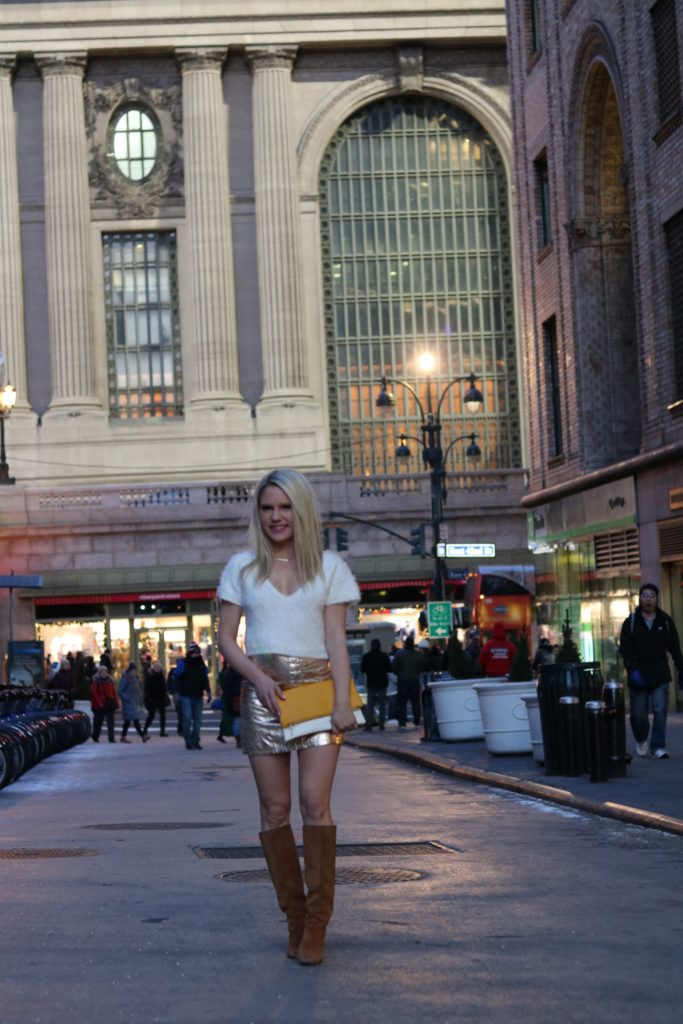 fuzzy white crop sweater and gold skirt