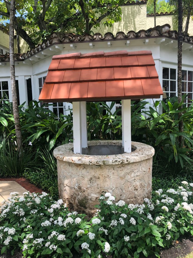 Brazilian court palm beach wishing well