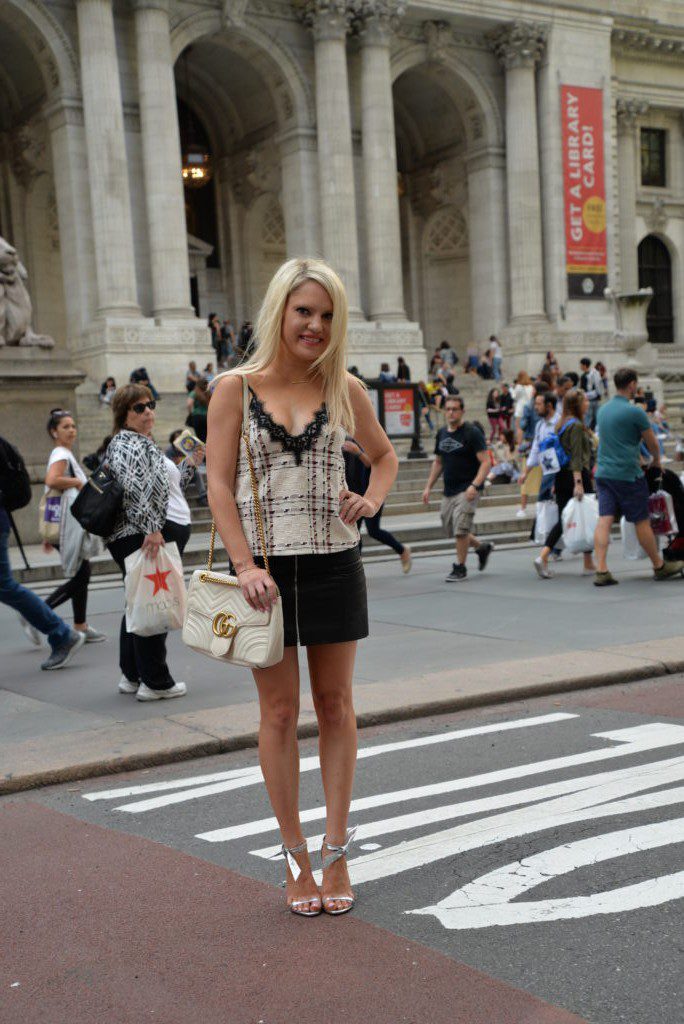 holiday attire outside of the NYC public library