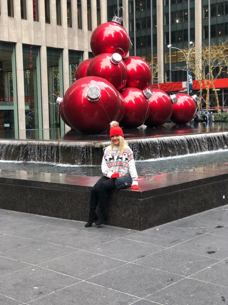 red ornaments on 6th avenue midtown Manhattan